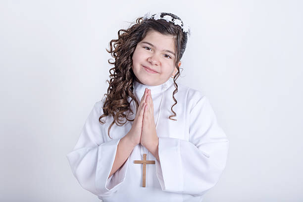 istock Little girl posing for the first communion 524161412
