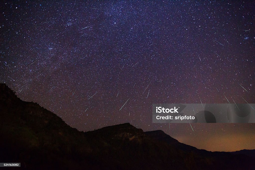 Geminid Meteor in the night sky geminid meteor shower Stock Photo