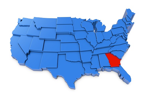 3D render of USA map with states. The map is blue and on a plain white background. 3D render of USA map with states. The map is blue and on a plain white background. 