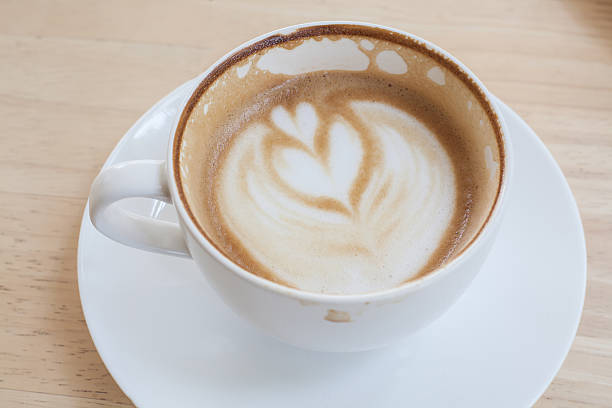 istock Latte Coffee art on the wooden table 524165166