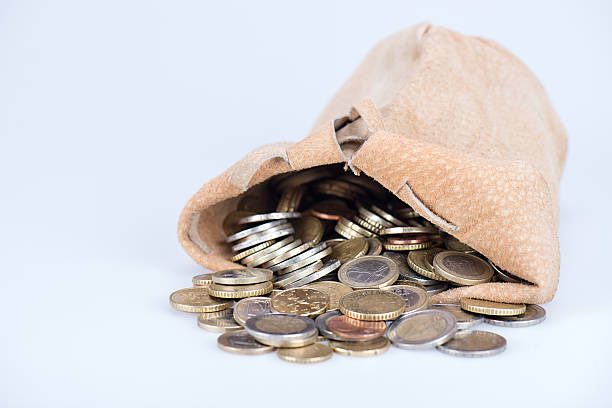 istock full bag of coins 524165572