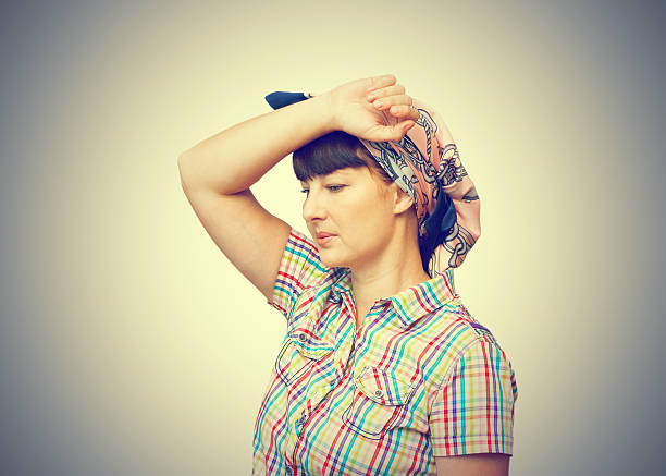 istock Tired housewife keeps his hand near his head. 524167838