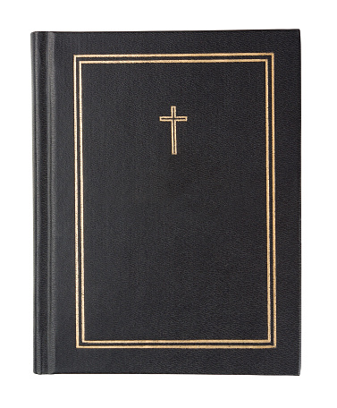 Black bible on a white background