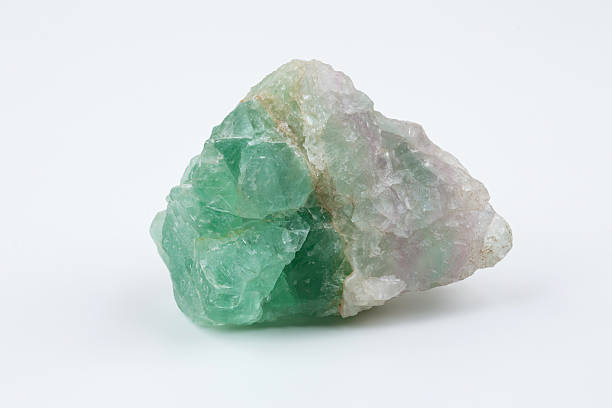 istock Green fluorite. Mineral natural stone on a white background. 524169758