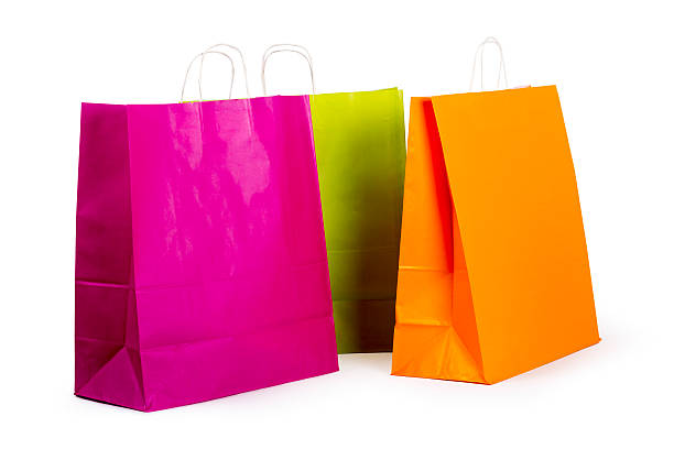 istock Colourful paper shopping bags isolated on white 524170049