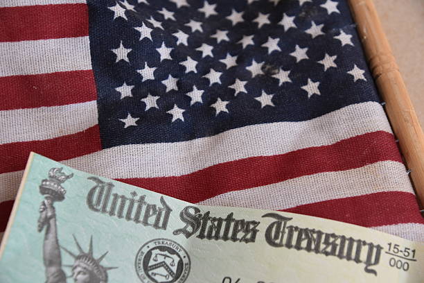 istock USA Treasury IRS refund check on American flag 524170760