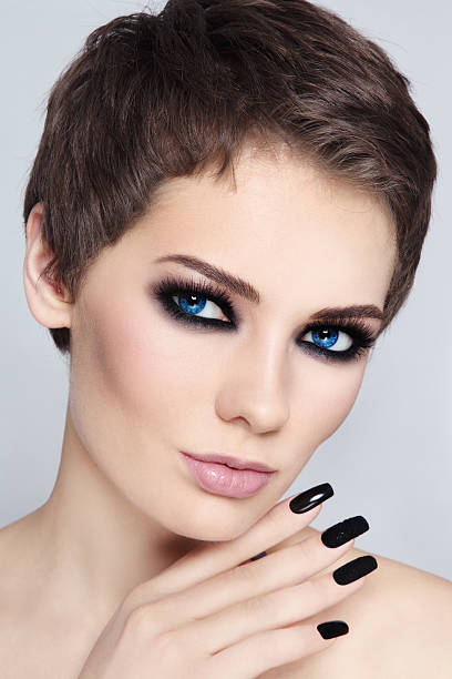 istock Smoky eyes and black nails 524171517
