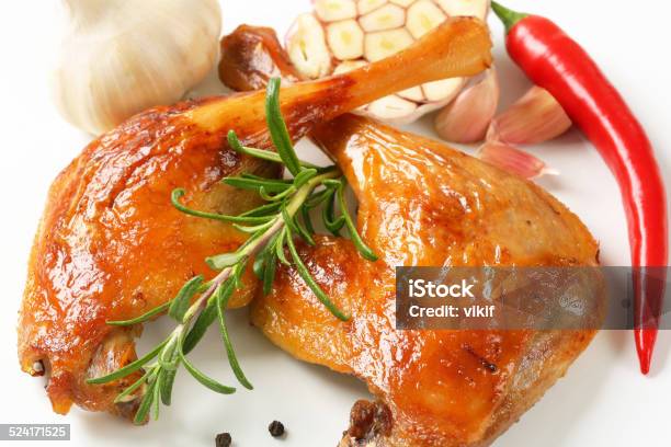 Roast Duck Legs Stock Photo - Download Image Now - Baked, Chicken Drumstick, Chili Pepper