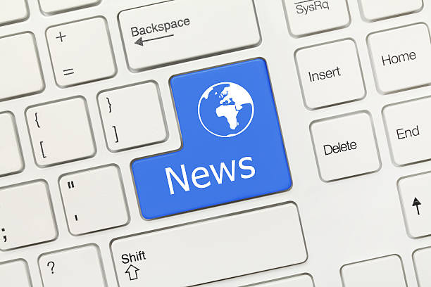 istock White conceptual keyboard - News (blue key with worldmap) 524172067