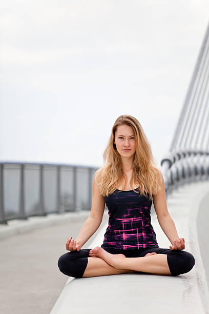 istock Resting and meditating in yoga position on the bridge 524172294