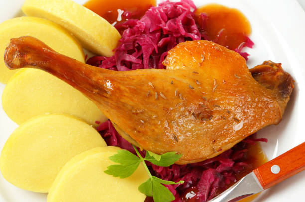 istock Roast duck with potato dumplings and red cabbage 524172325
