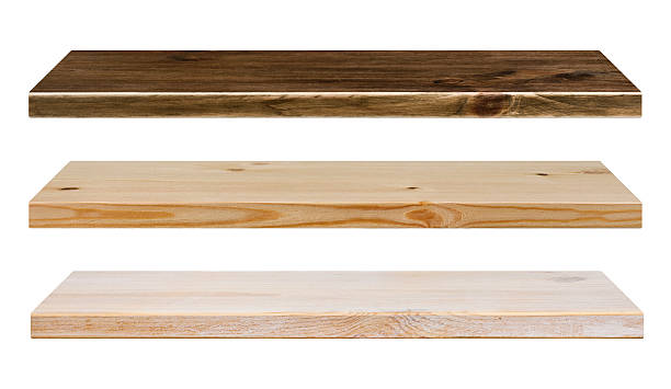 istock Different color wooden shelves isolated on white 524174615