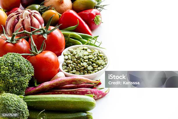 Green Peas In And Vegetables On A White Background Stock Photo - Download Image Now - Bean, Border - Frame, Bowl