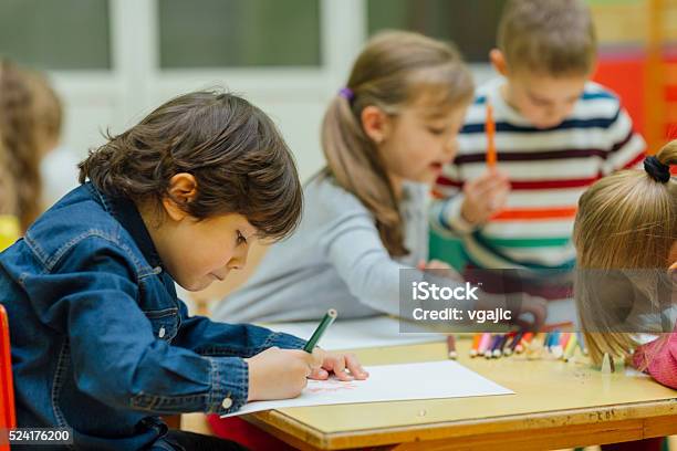 Happy Little Boy In Kindergarten Stock Photo - Download Image Now - Drawing - Activity, Preschool, Child
