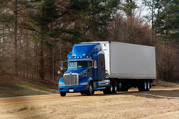 istock Blue Semi Truck on the Highway 524176481