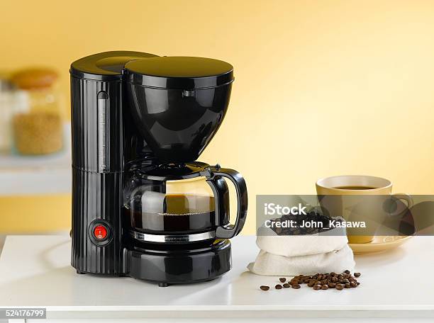 Coffee Blender And Boiler With Coffee Seeds In A Kitchen Stock Photo - Download Image Now