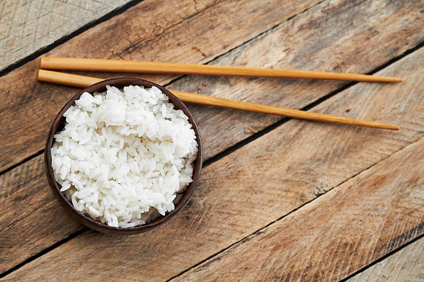 istock Bowl of rice and food sticks 524178130