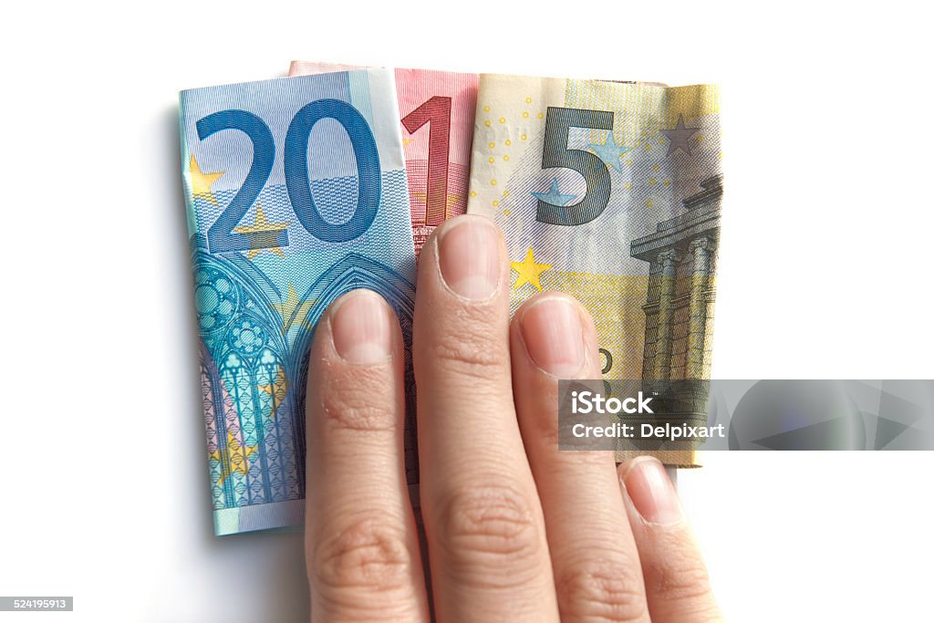 2015 written with euros bank notes in a hand 2015 written with euros bank notes in a hand isolated on white background 2015 Stock Photo
