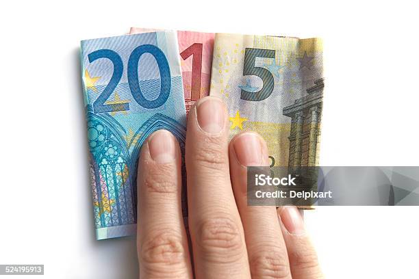 2015 Written With Euros Bank Notes In A Hand Stock Photo - Download Image Now - 2015, Annual Event, Bank - Financial Building