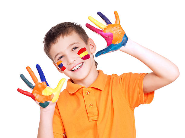 istock Happy smiling boy with a painted hands and face. 524199761