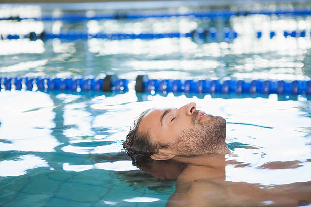 istock Close-up side view of a fit swimmer in the pool 524201319