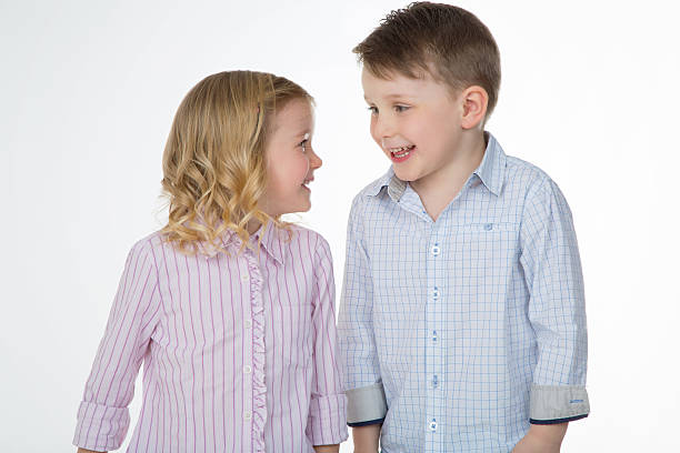 istock closeup of cheerful children on white background 524230275