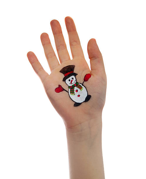 Snow man painted on the girl's hand