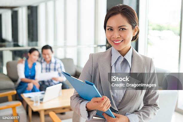 Cheerful Estate Agent Stock Photo - Download Image Now - Mortgage Document, Mortgage Loan, Trader
