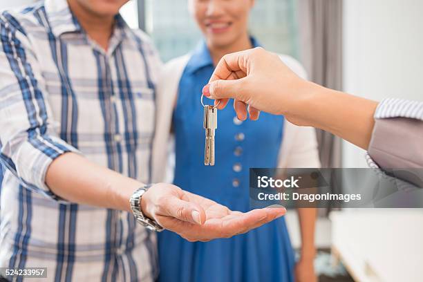 Giving Keys Stock Photo - Download Image Now - House, Selling, Giving