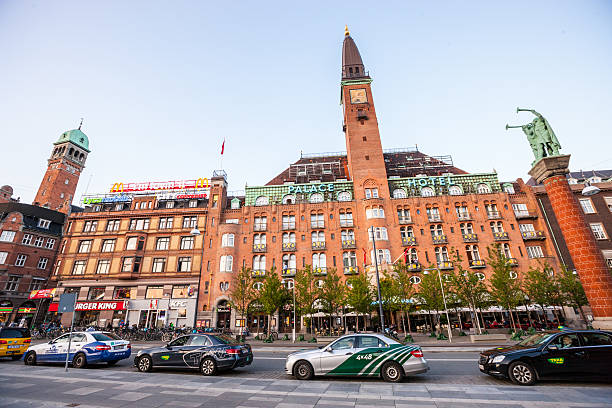 Taxis waiting for clients in Copenhagen Copenhagen, Denmark - September 11, 2014: Taxis waiting for clients in Copenhagen, City Hall square in front of Palace Hotel town hall square copenhagen stock pictures, royalty-free photos & images
