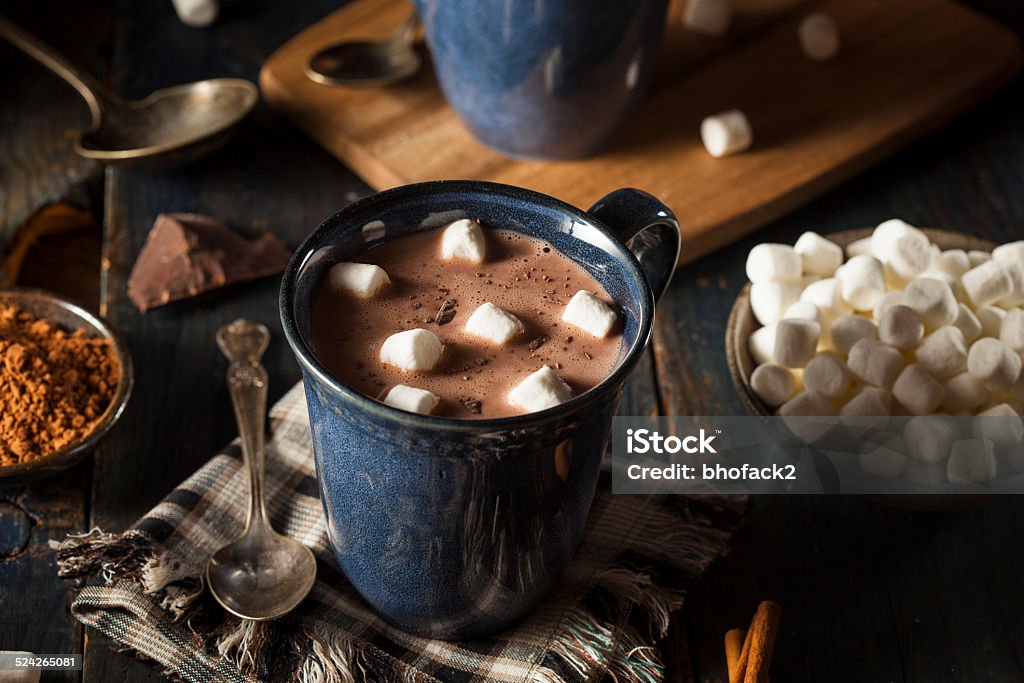 Homemade Dark Hot Chocolate Homemade Dark Hot Chocolate with Marshmallows and Cinnamon Alcohol - Drink Stock Photo