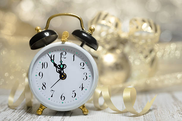 istock Old alarm clock showing five to midnight. Happy New Year! 524266009