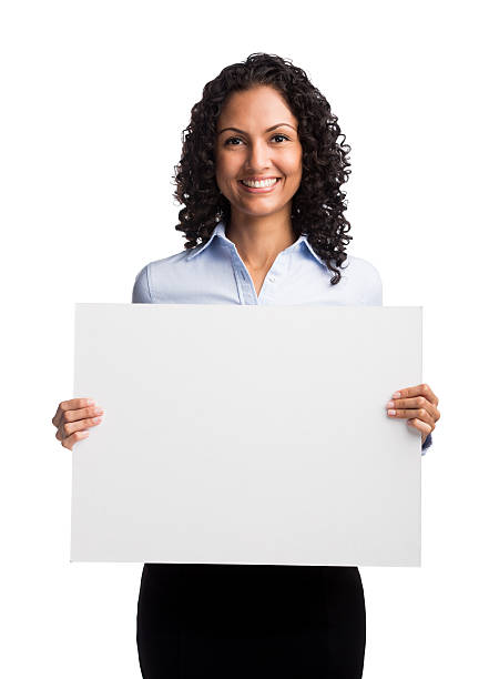 mujer de negocios mostrando cartel - businesswoman advertise placard advertisement fotografías e imágenes de stock