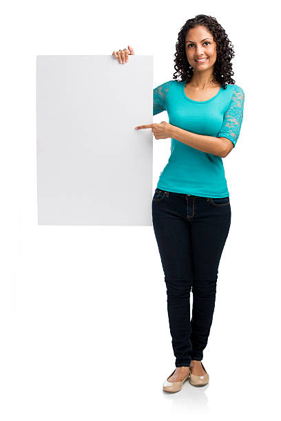 istock Woman pointing at placard 524283611