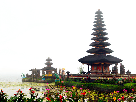 Pura Ulun Danu Bratan on foggy background.