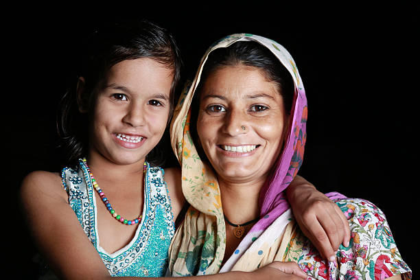 istock Indian Women Standing with Her Daughter 524286625