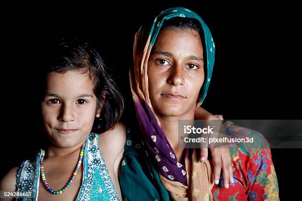 Indian Women Standing With Her Daughter Stock Photo - Download Image Now - 30-39 Years, 6-7 Years, 8-9 Years