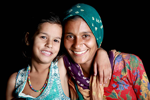 istock Indian Women Standing with Her Daughter 524286659