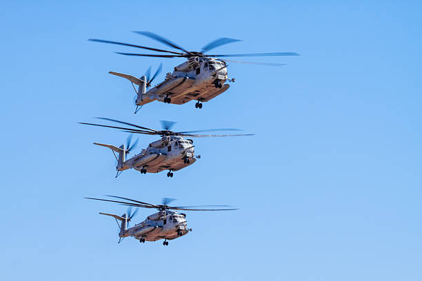 Three CH-53E Super Stallion (Sikorsky) Helicopter formation Three CH-53E Super Stallion (Sikorsky) Helicopter formation us marine corps stock pictures, royalty-free photos & images