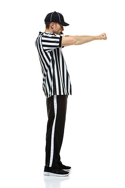istock Football referee showing illegal use of hands 524287165
