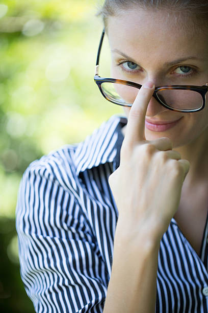 istock Woman touching  sunglasses 524289231