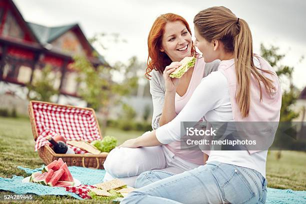 Having Lunch Outdoors Stock Photo - Download Image Now - 20-24 Years, Adult, Adults Only