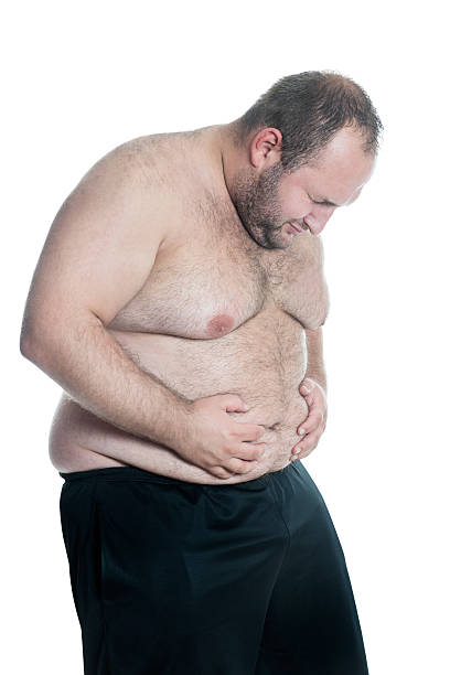 istock Overweight or Fat Shirtless Man Heaving Stomachache 524290167