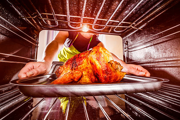 istock Cooking chicken in the oven at home. 524297635