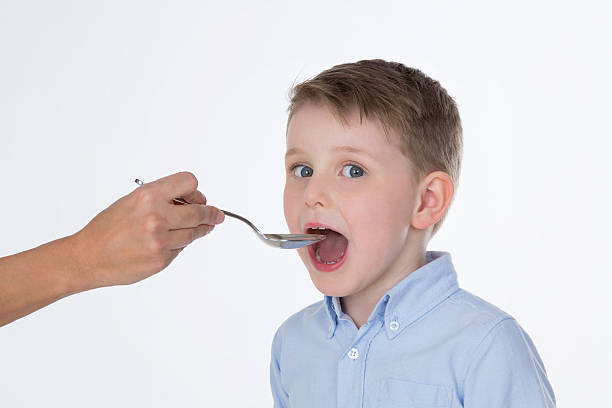 istock sick male kid on isolated background 524297727