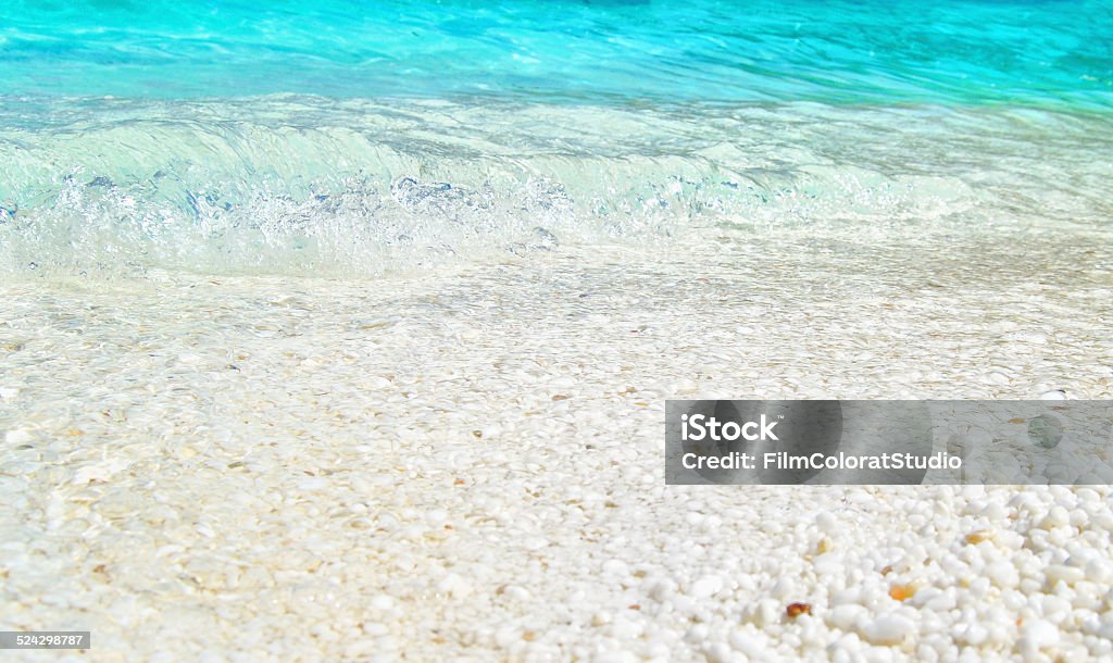 Marble beach close-up. Marble beach close-up. Theses, Greece location. Space for text and design. Abstract Stock Photo