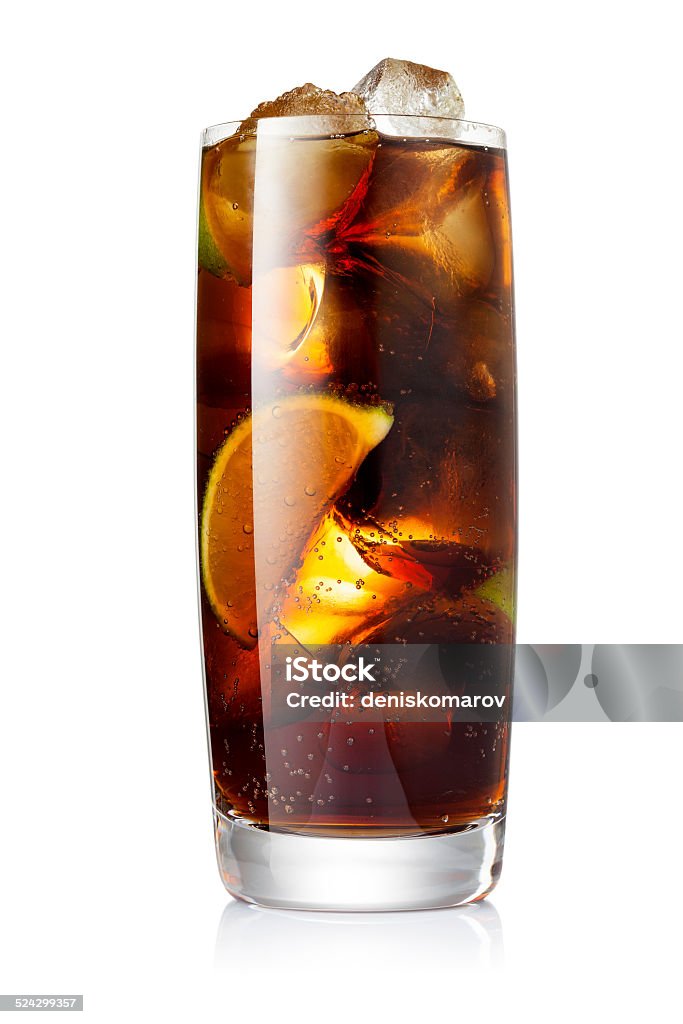 Cola with ice and lime Glass of cocktail with cola, rum and limes slices isolated on white background Cola Stock Photo