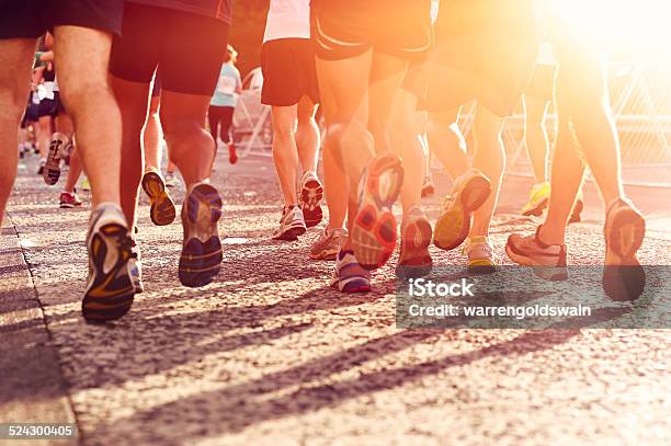 People Running Marathon Stock Photo - Download Image Now - Marathon, Running, Blurred Motion