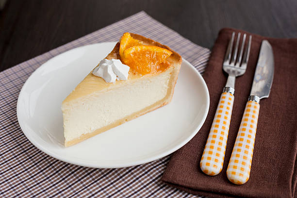 istock Cheesecake Dessert decorated with oranges and meringue 524300721