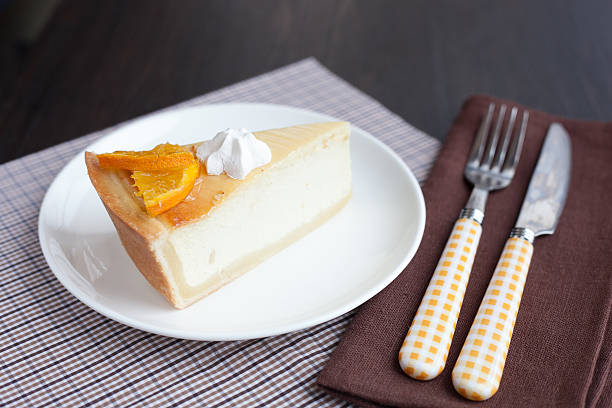 istock Cheesecake Dessert decorated with oranges and meringue 524300729